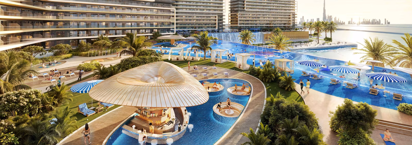 The podium pool deck at Chelsea Residences, looking across the water towards Downtown Dubai